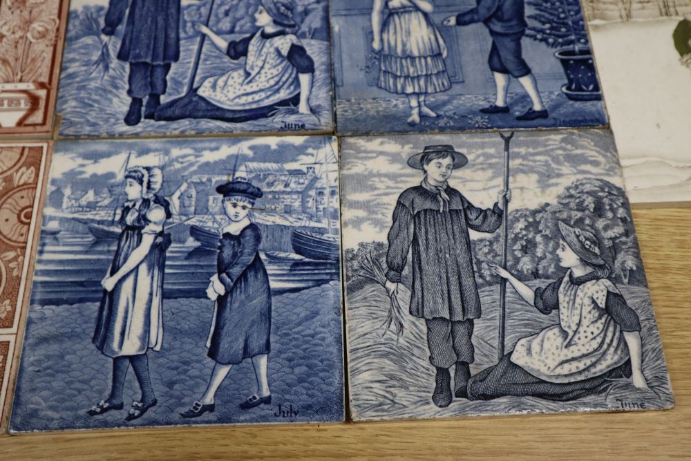 A collection of 19th/early 20th century transfer-printed and moulded wall tiles,